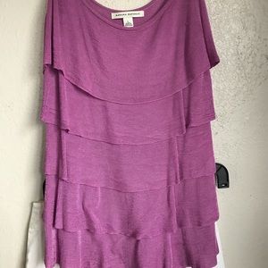 Lavender tank and white skirt.